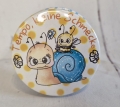 Button Kühlschrankmagnet *Tempo-Schnecke* 59mm gelb Punkte